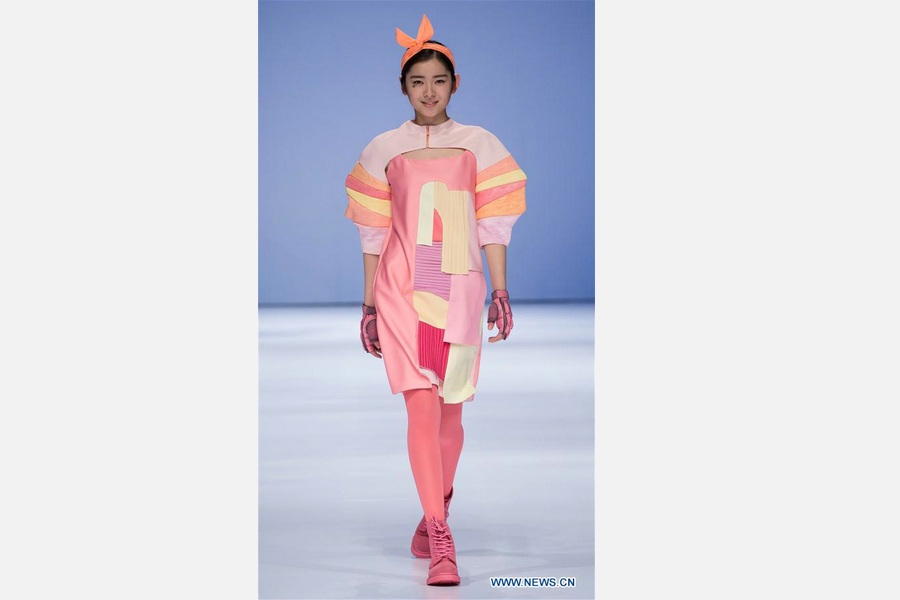 Models show creations at fashion week of institute in Beijing