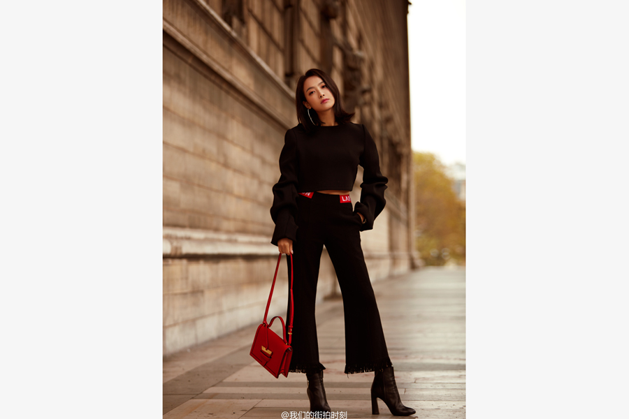 Song Qian poses for street style photos