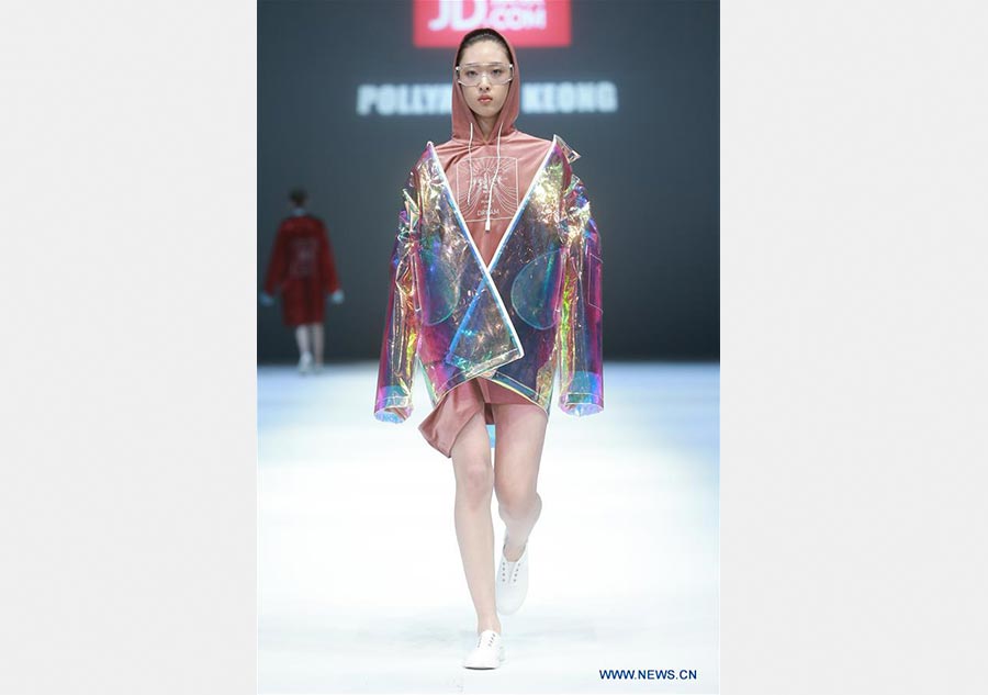 Models present creations of Jiang Yueyin at China Fashion Week