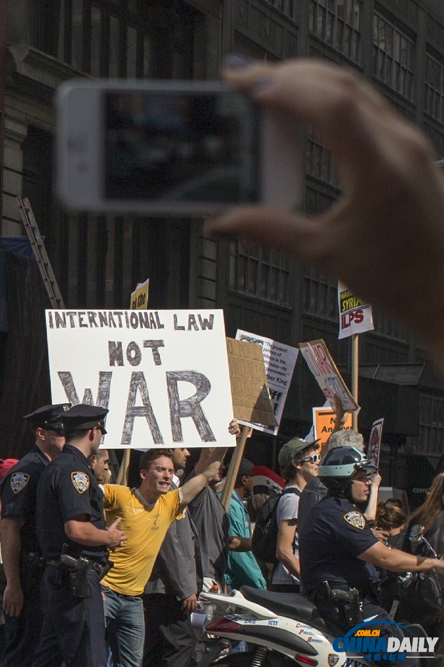美國多地反戰游行 要求國會否決軍事打擊敘利亞提案
