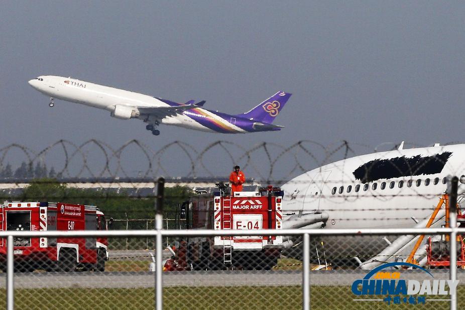 泰航一飛機(jī)因故障沖出跑道 9名中國乘客受傷（高清組圖）