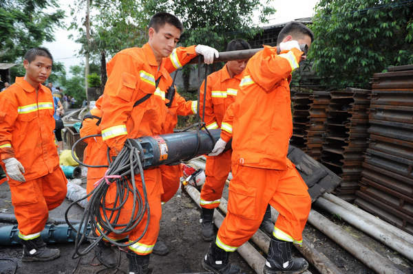 21 coal miners trapped underground in SW China