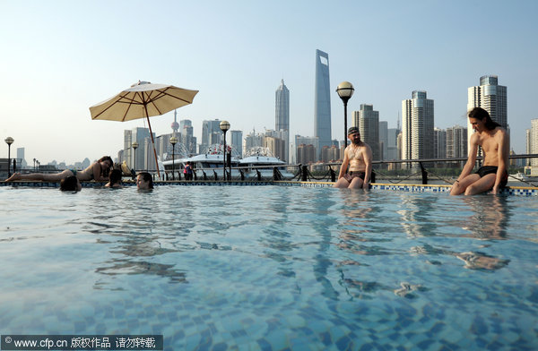 Sand, swimming, and the city skyline on the Bund