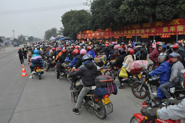 Annual mass motorbike migration revs home