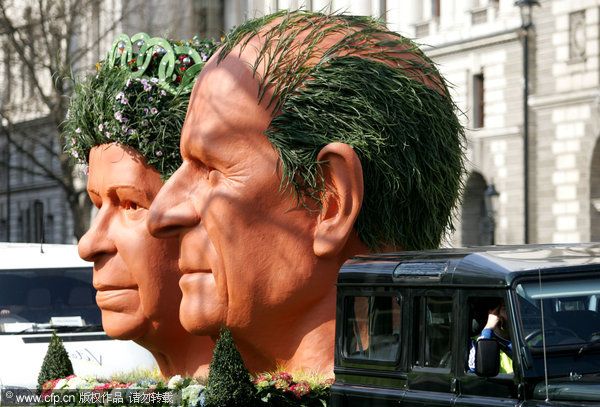 Mock up of the heads of UK's Queen, Prince