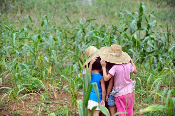 Left behind, children turn to nature