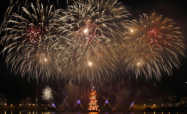 Fireworks burst over lake in Rio de Janeiro