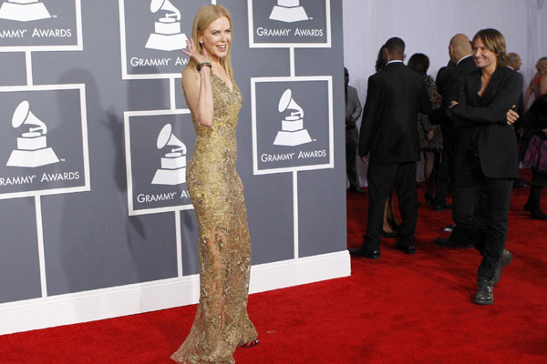 Stars show skin, but adhere to Grammy dress code