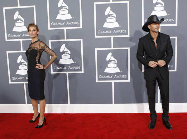 Stars show skin, but adhere to Grammy dress code