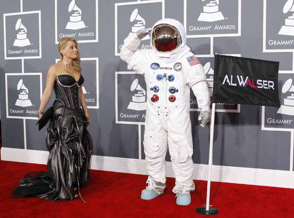 Stars show skin, but adhere to Grammy dress code