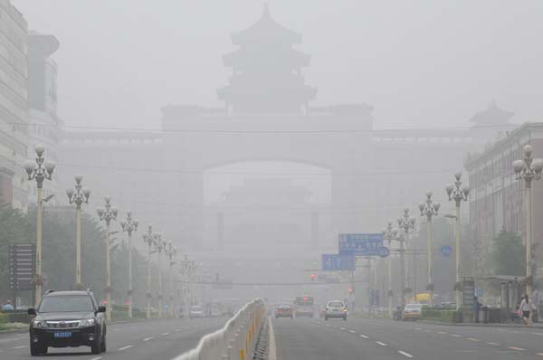 Fog descends on Beijing after rainfall