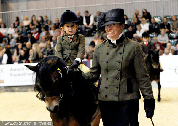 Harry, 3, rides into history books