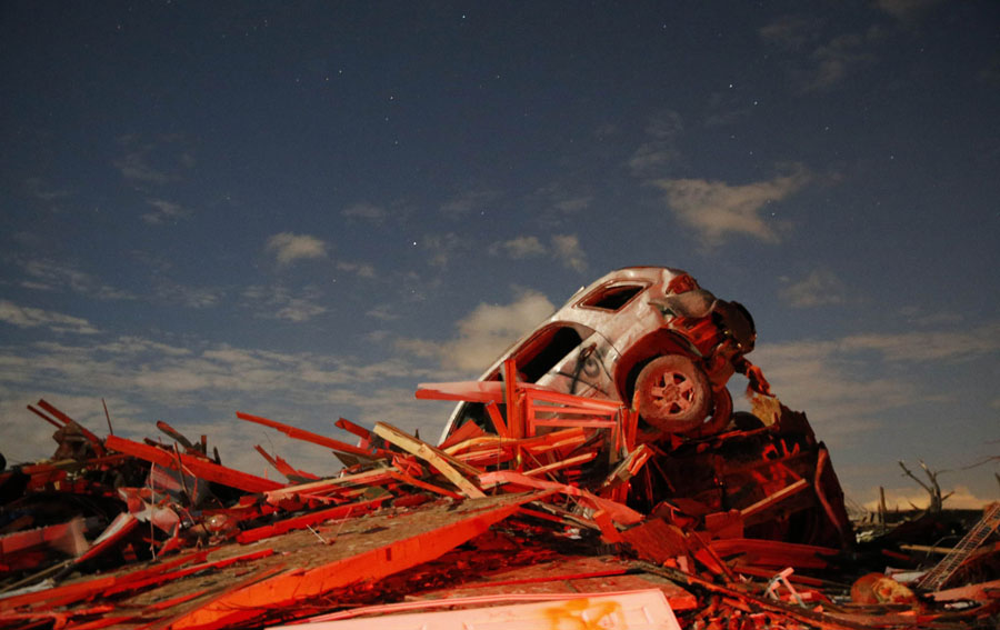 In pictures: Deadly tornados pound US Midwest