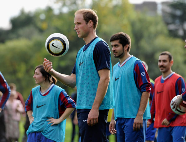 A football match hosted at Buckingham Palace