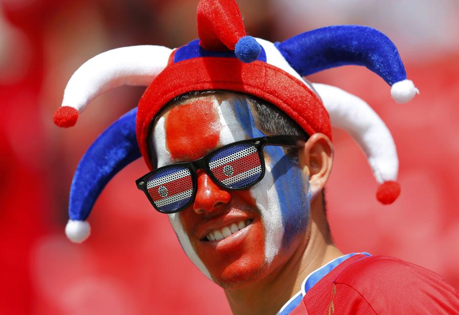 National flags on fan's face