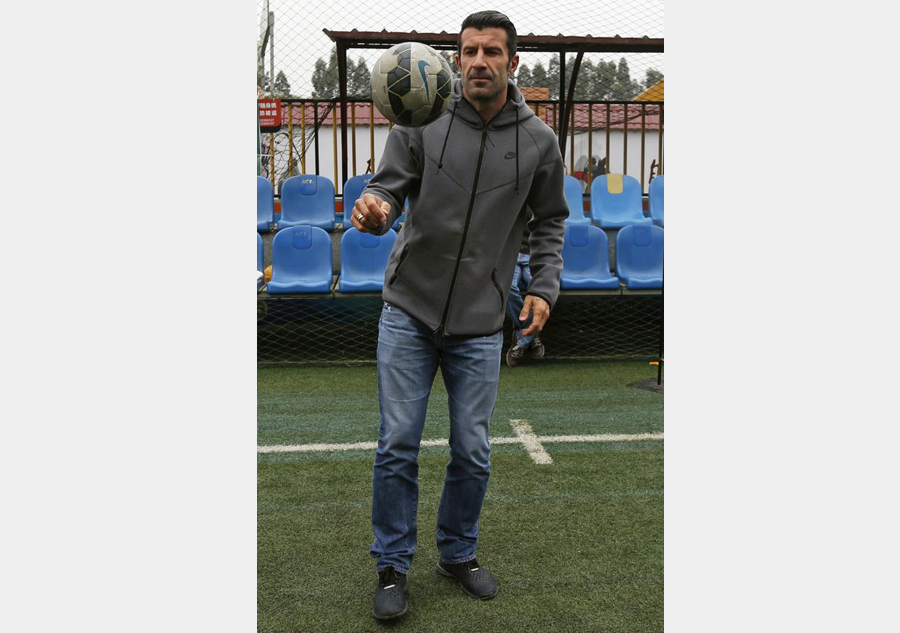 Figo charms soccer fans in Guangzhou