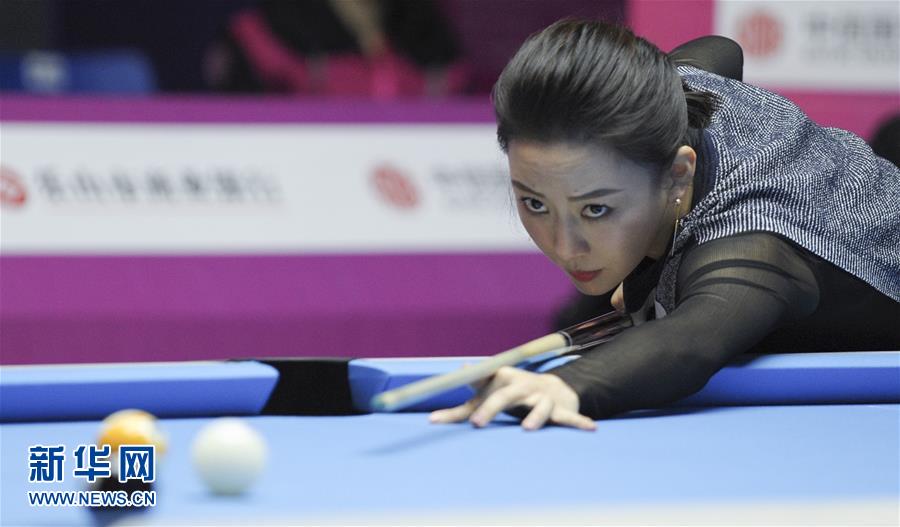 Pan Xiaoting competes in nine ball game in SW China