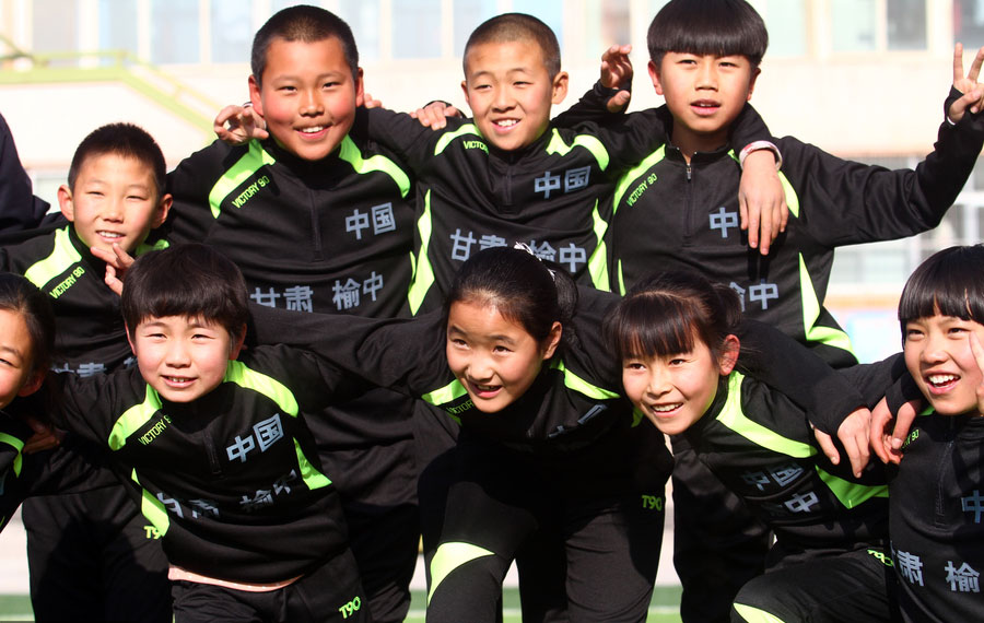 Kids from Gansu get soccer training by Arsenal in UK