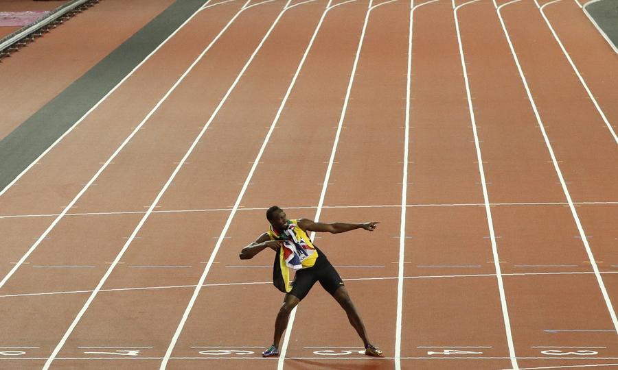 Gatlin stuns Bolt to win 100m world title, Su finishes 8th