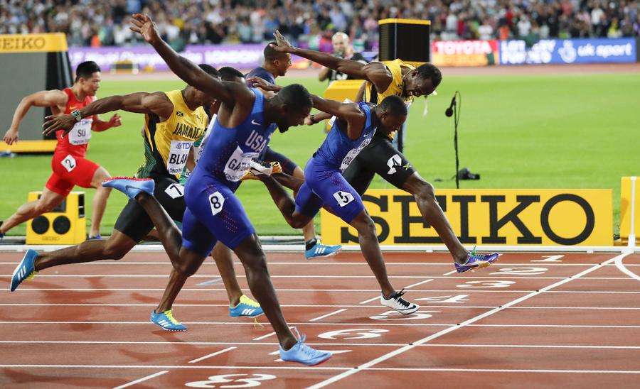 Gatlin stuns Bolt to win 100m world title, Su finishes 8th