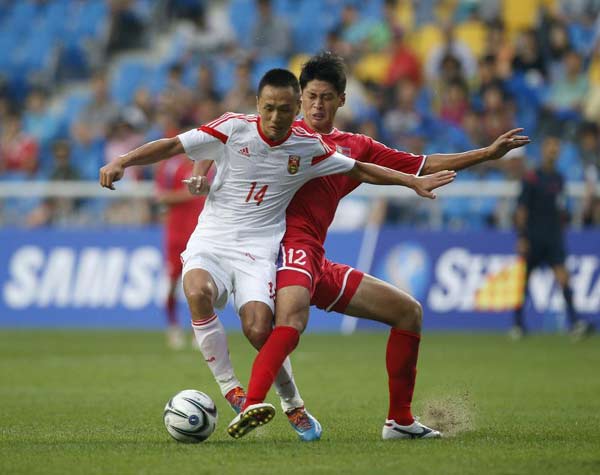 China loses Asian Games soccer opener 3-0