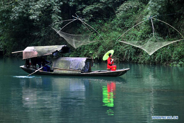 Three-Gorges Tribe Scenic Spot attracts tourists in C China