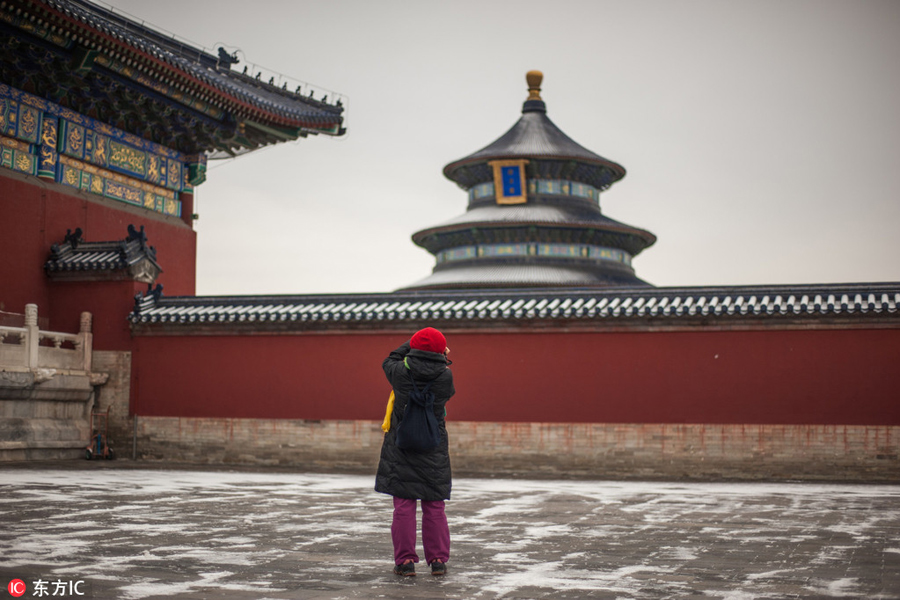 Season’s first snow meets the Temple of Heaven