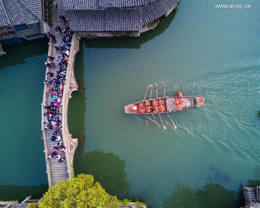 Boat competition held to celebrate Sanyuesan Festival in E China