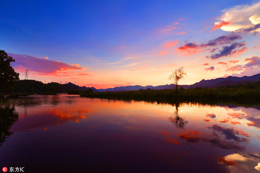 Beautiful Zhejiang village under colorful sunset glow