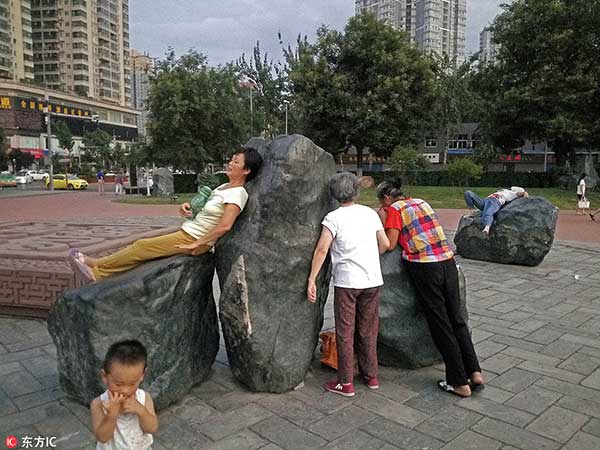 Hot stones become hot method to treat illnesses in Xi'an