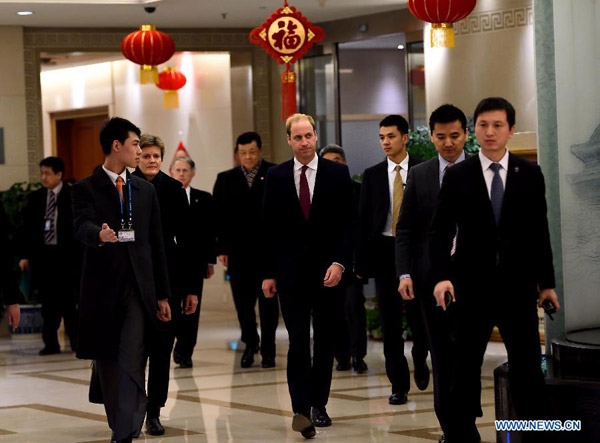 Prince William arrives in China to warm welcome