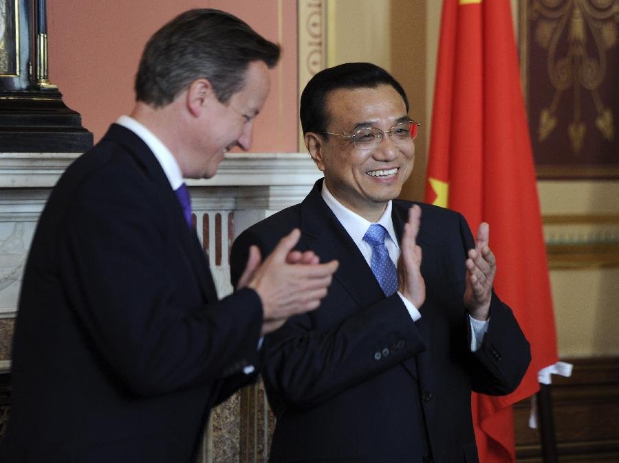 Premier Li meets British Queen, Prime Minister