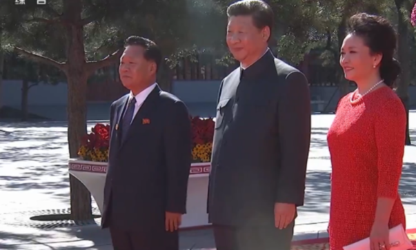 President Xi welcomes guests