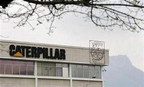 Caterpillar reports first loss since '92