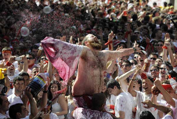 Revellers celebrate San Fermin Festival in Spain