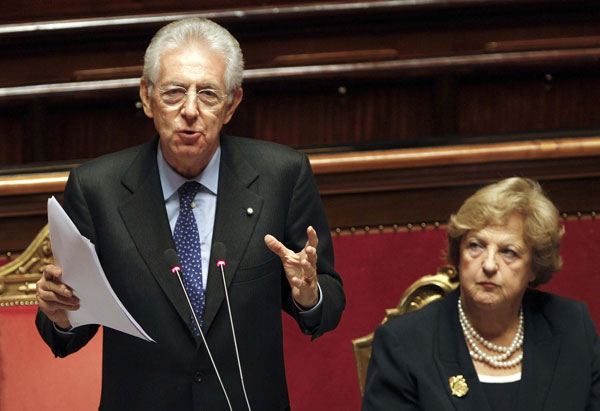 New Italy PM Monti easily wins confidence vote