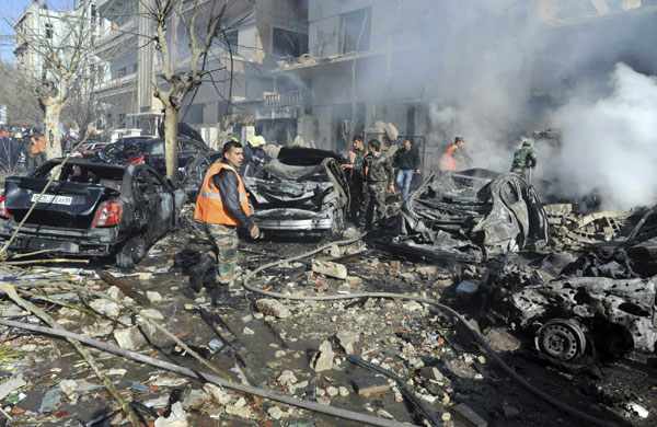 Blasts in Syrian capital kill 27