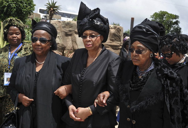 Mandela's ex-wife denies family at war