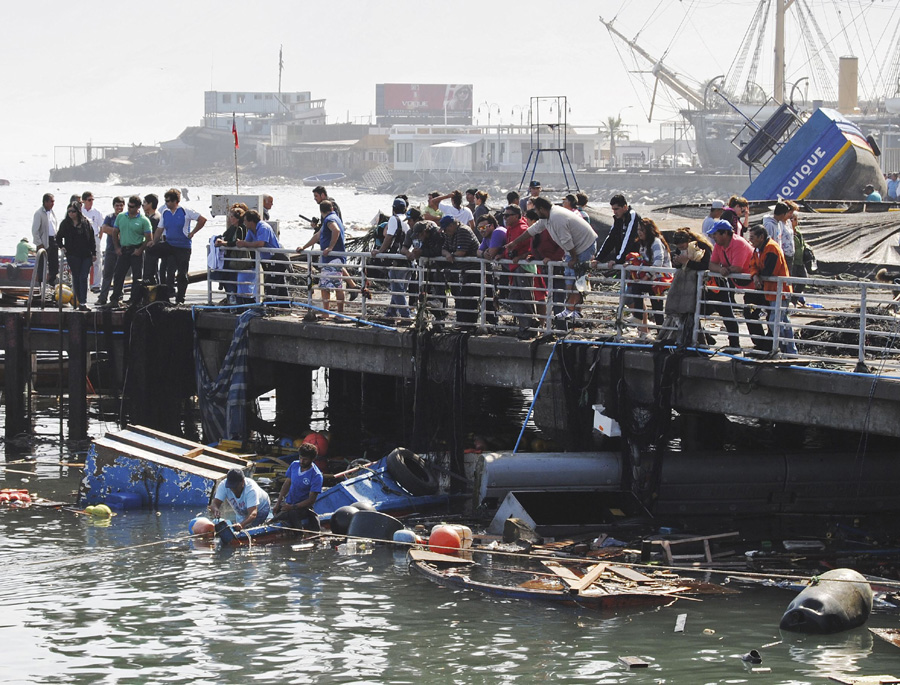 Chile assesses damage after massive quake, tsunami