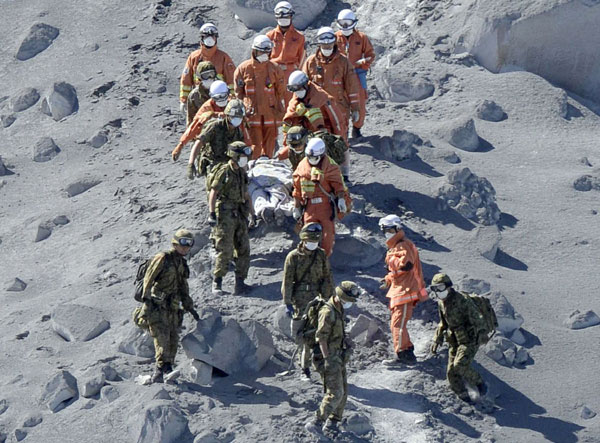 Over 30 feared dead after Japan volcano spews ash and rock