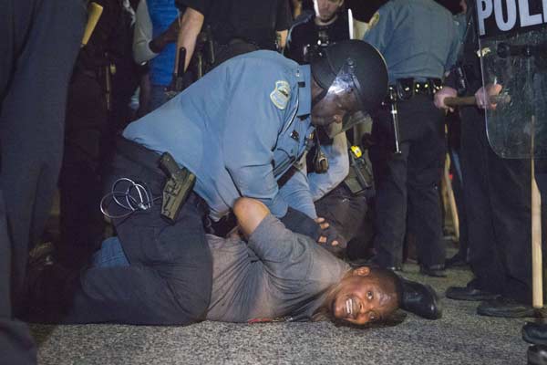 Two officers shot outside Ferguson police department