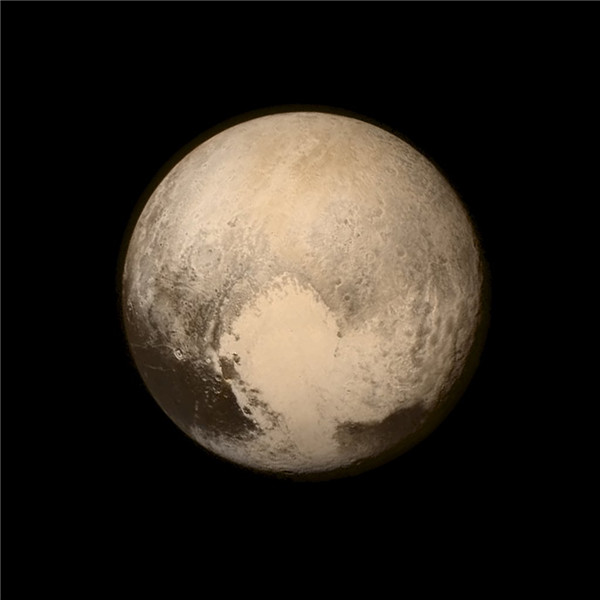 Tiny Pluto sports big mountains, New Horizons finds