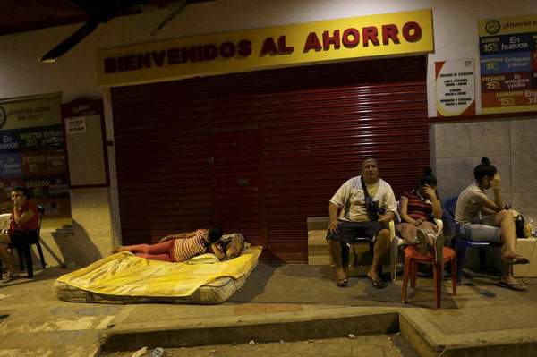 Shaken Ecuador hunts for survivors amid 7.8 quake debris