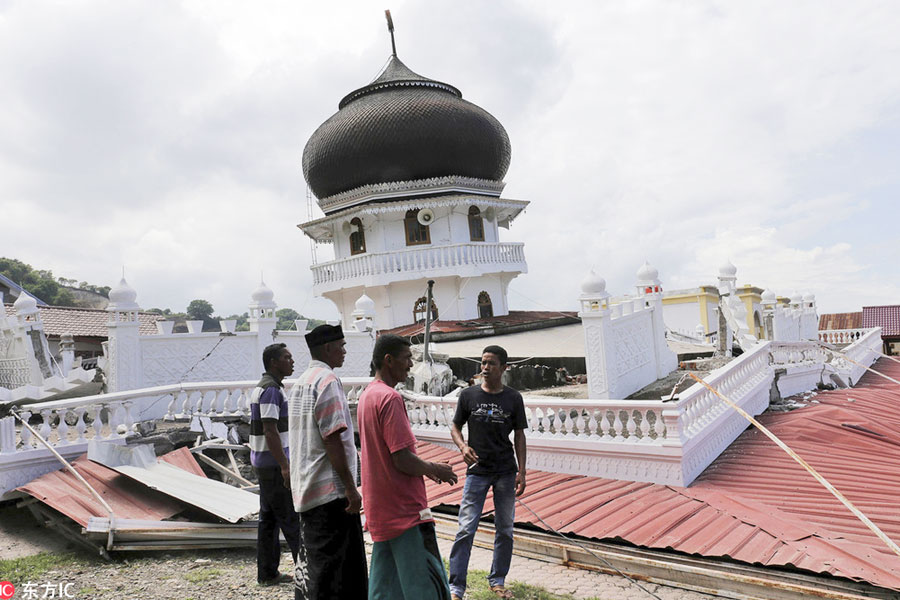 Nearly 100 killed, hundreds hurt as quake strikes Indonesia