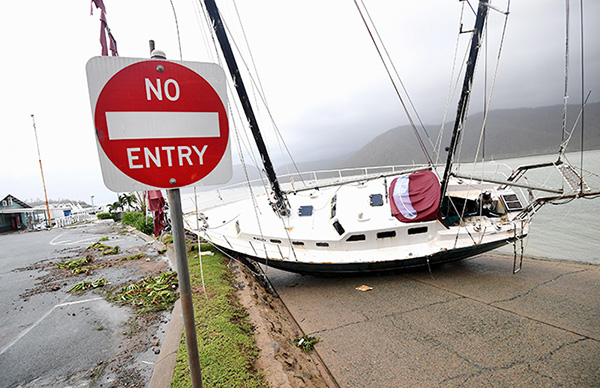 Schools closed, tourism affected, as Cyclone Debbie aftermath unfolds in Australia